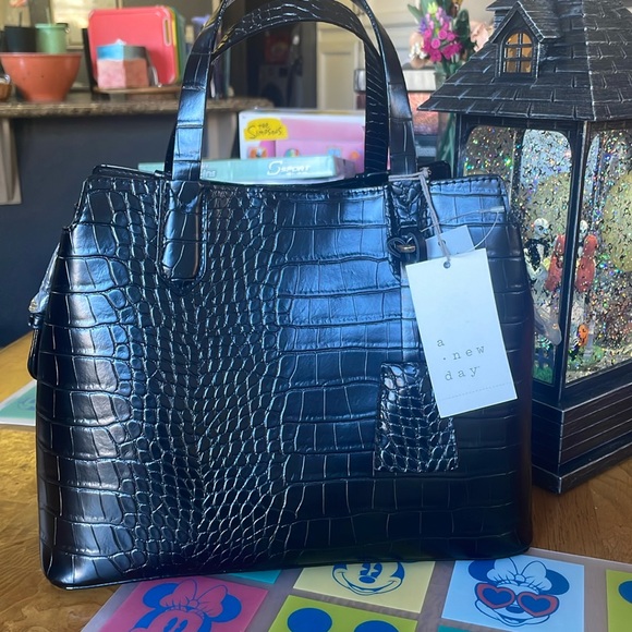 a new day Handbags - A new day purse converts to a crossbody or shoulder bag